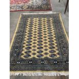 A Bokhara style cotton pile rug, 178 x 126cm