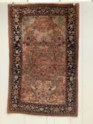 A Tabriz peach ground 'Tree of Life' rug, 194 x 126cm