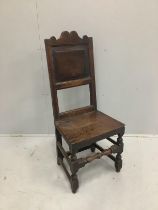 A 17th century Provincial oak panelled back stool, height 109cm