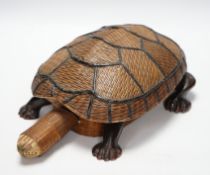 A collection of Chinese Soapstone carvings and a straw woven novelty tortoise shaped basket,
