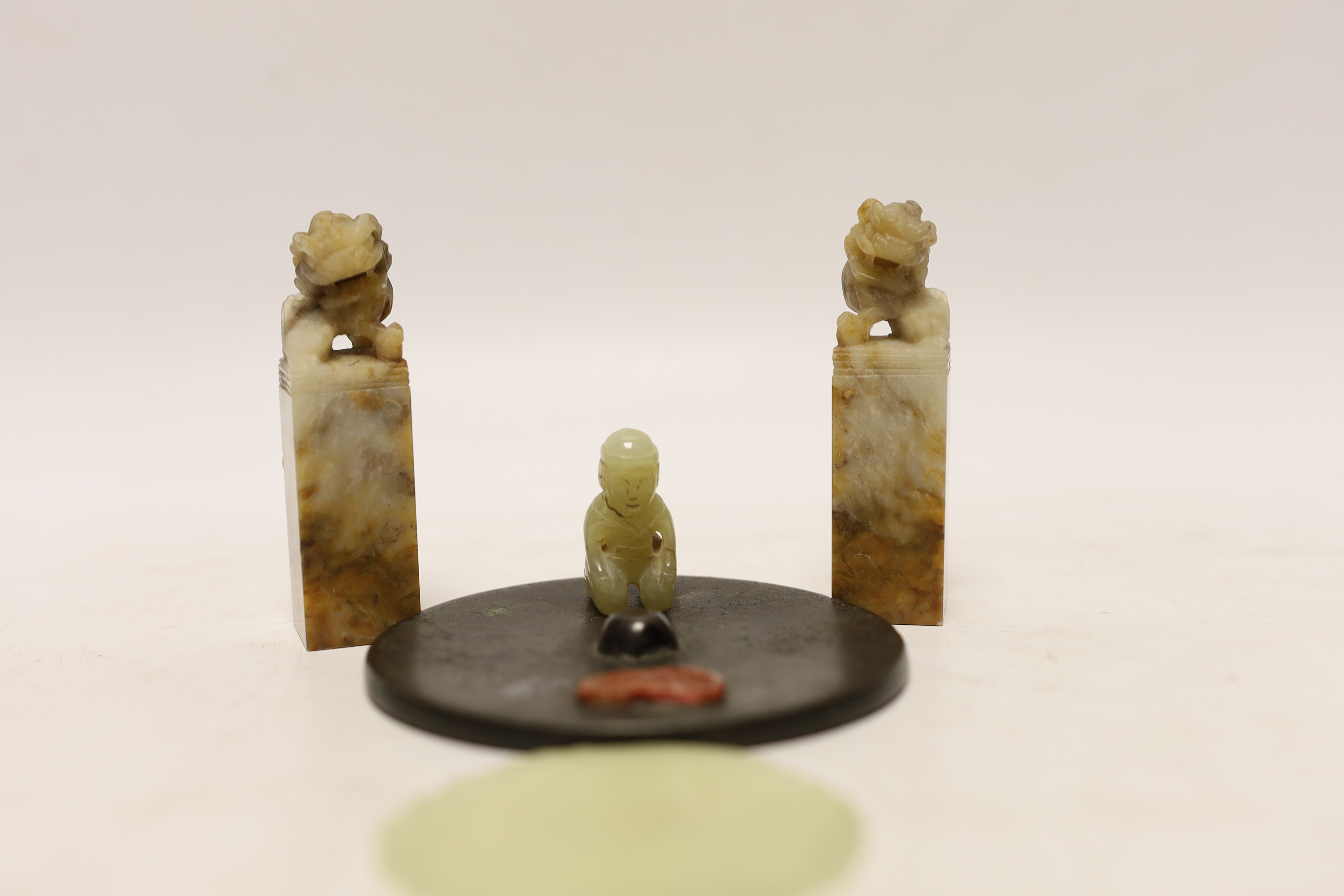 Two Chinese lion dog seals, a carved jade disc, a hard stone disc with partial wax seal and carved - Image 2 of 4