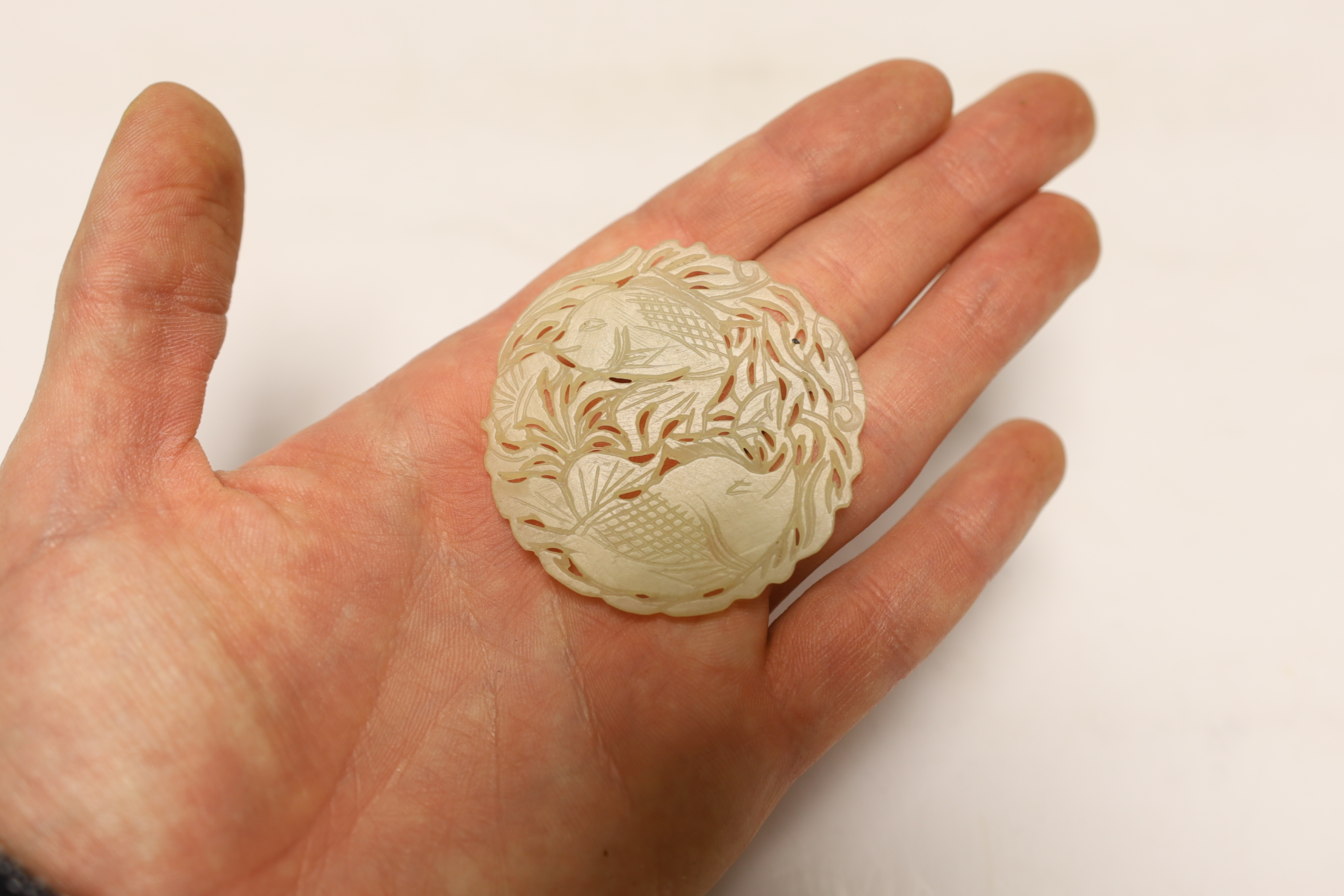 Two Chinese lion dog seals, a carved jade disc, a hard stone disc with partial wax seal and carved - Image 3 of 4