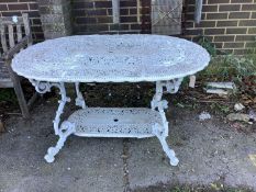 A Victorian style cast aluminium garden table, width 140cm, depth 94cm, height 72cm