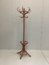 A turned beech combined hat and stick stand