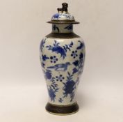 A late 19th century Chinese crackle glaze vase and cover, 30cm