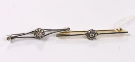 An early to mid 20th century, yellow metal and nine stone diamond cluster set flower head bar
