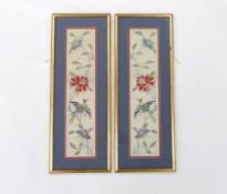 A pair of framed early 20th century Chinese cream silk polychrome silk embroidered sleeve bands,