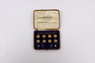 An early 20th century 9ct and chalcedony set ten piece dree stud set, in fitted gilt tooled