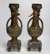 After Hippolyte François-Moreau (1832-1927), a pair of bronzed spelter cherubic vases on marble