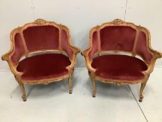A pair of late 19th / early 20th century French carved beech fauteuils, width 80cm, depth 62cm,