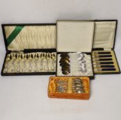 Four cased Continental cutlery sets, one 800 standard