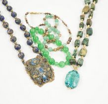 Three assorted Chinese bead necklaces including filigree gilt white metal and enamel pendant