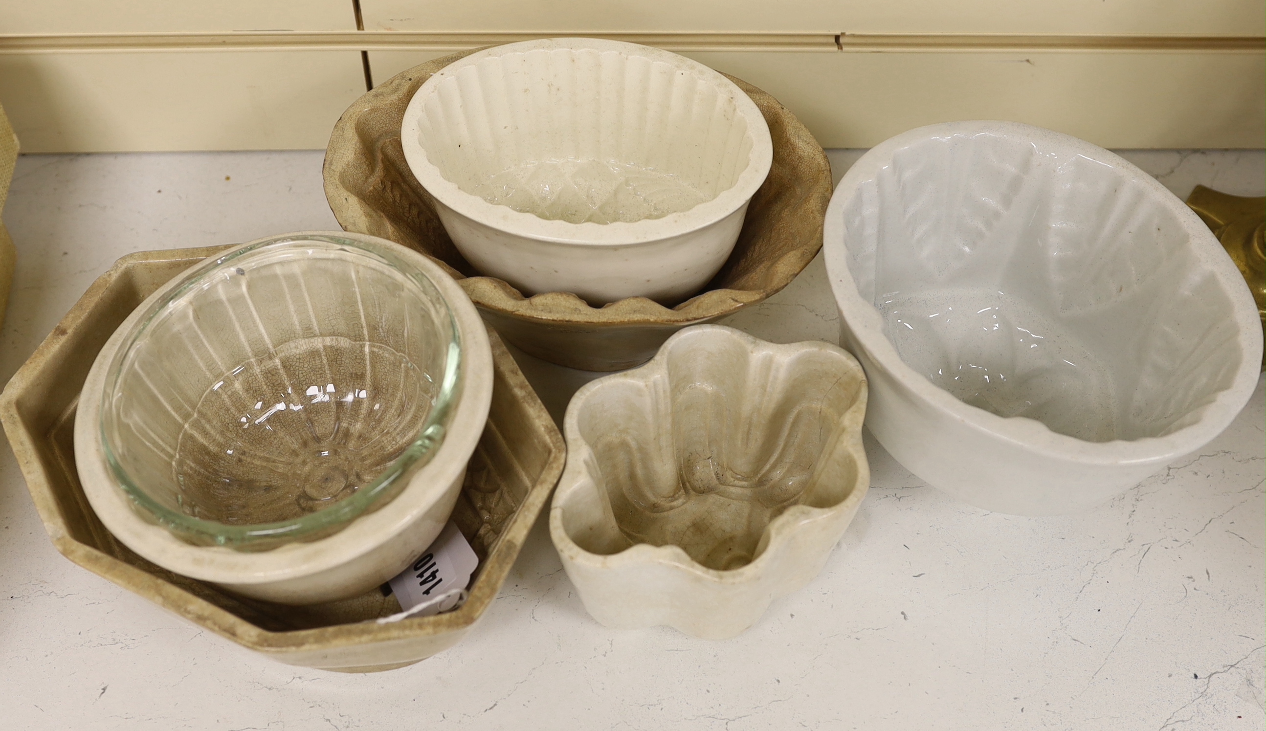 Six ceramic and a glass jelly mould, (7) largest 22cm wide - Image 2 of 2