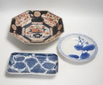 A late 17th/early 18th century Japanese Arita dish (a.f) and two other Arita pieces, largest 27cm