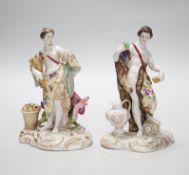 A pair of German Volkstedt porcelain figures including female with dragon, 15cm high