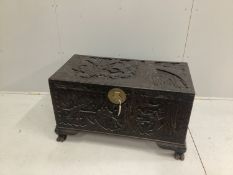 * * A late 19th century Cantonese carved camphorwood chest, width 100cmPlease note this lot attracts