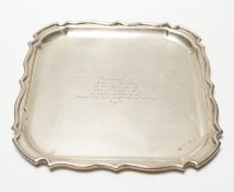 A George V silver shaped square presentation salver, with later engraved inscription, A.E.