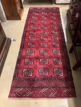 A Bokhara red ground runner, 232 x 80cm