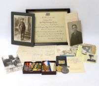 An archive of family collection of medals, photographs and documents including a WWI trio of War