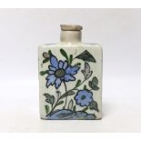 An Iznik tin-glazed pottery flask and cover, 15cm