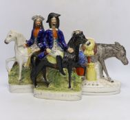 Three mid 19th century Staffordshire figure groups including Dick Turpin, Tom King and Sand, tallest