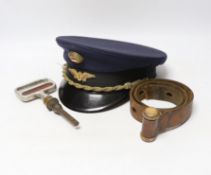 A post WWII Austrian National Railway Guard's hat and original window leather strap and emergency