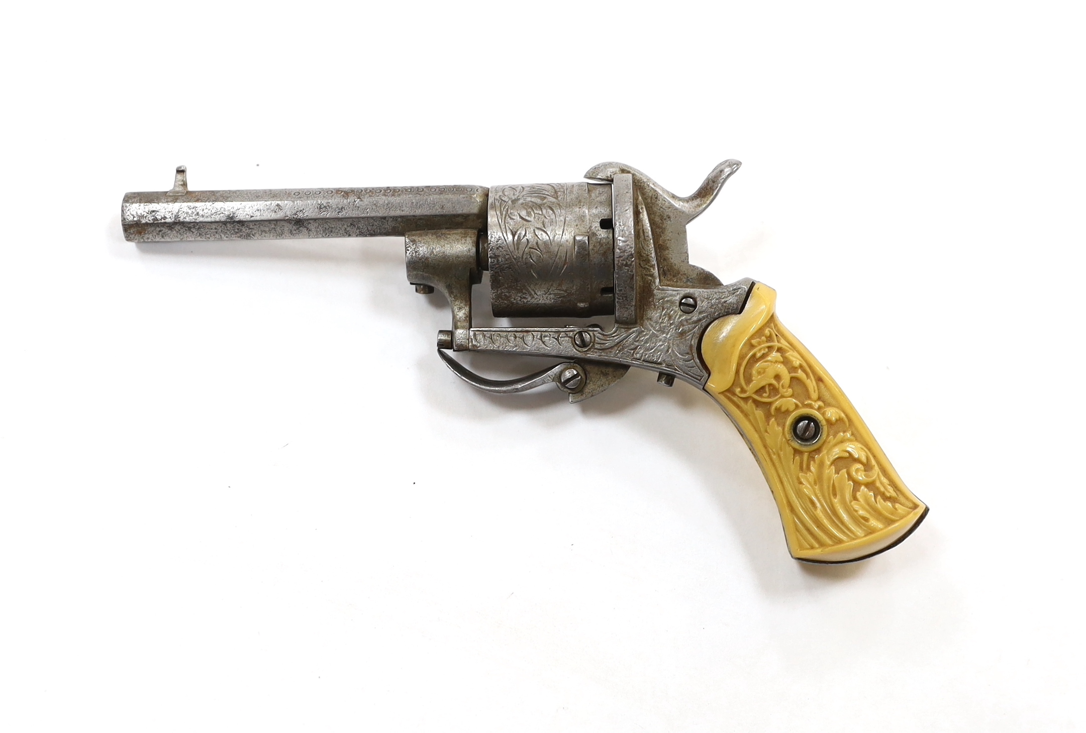 A six shot, 7mm Belgian self cocking pinfire revolver, octagonal barrel, roll engraved frame and - Image 2 of 3