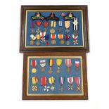 Twenty-seven medals and awards mounted in oak frames, including; French 1939-45 War Medal, Poland