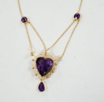 A Victorian style 9ct and four stone amethyst drop pendant necklace, the pendant set with heart