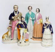 Four mid 19th century Staffordshire figure groups including Queen Victoria and Prince Albert, two
