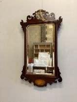 A George III style inlaid mahogany fret cut wall mirror, width 50cm, height 90cm