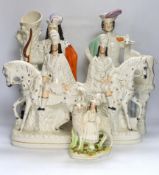 A pair of large mid 19th century Staffordshire pottery highland hunters, on horseback and three