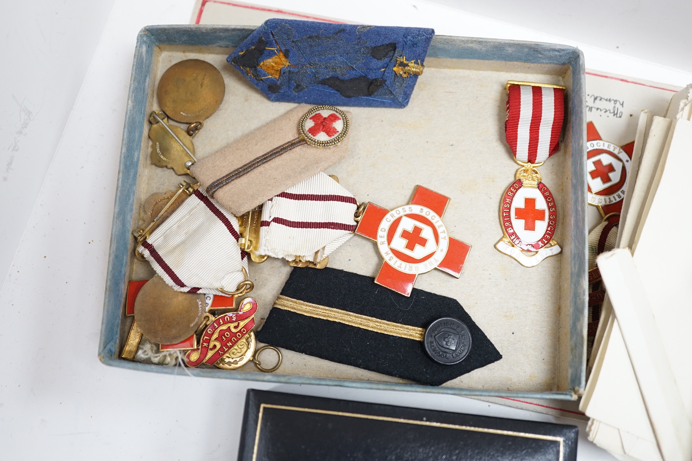A collection of British Red Cross, medals, badges and memorabilia including a brass plaque, - Image 3 of 4