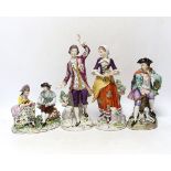 Four Sitzendorf porcelain figures in groups, early 20th century, 26cm