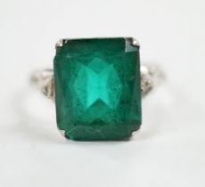 A 14k and single stone green paste set ring, with diamond chip set shoulders, size P, gross weight