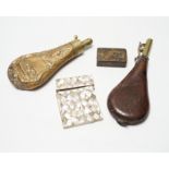 A Victorian embossed brass powder flask, a leather shot flask and a Victorian mother of pearl and