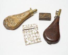 A Victorian embossed brass powder flask, a leather shot flask and a Victorian mother of pearl and