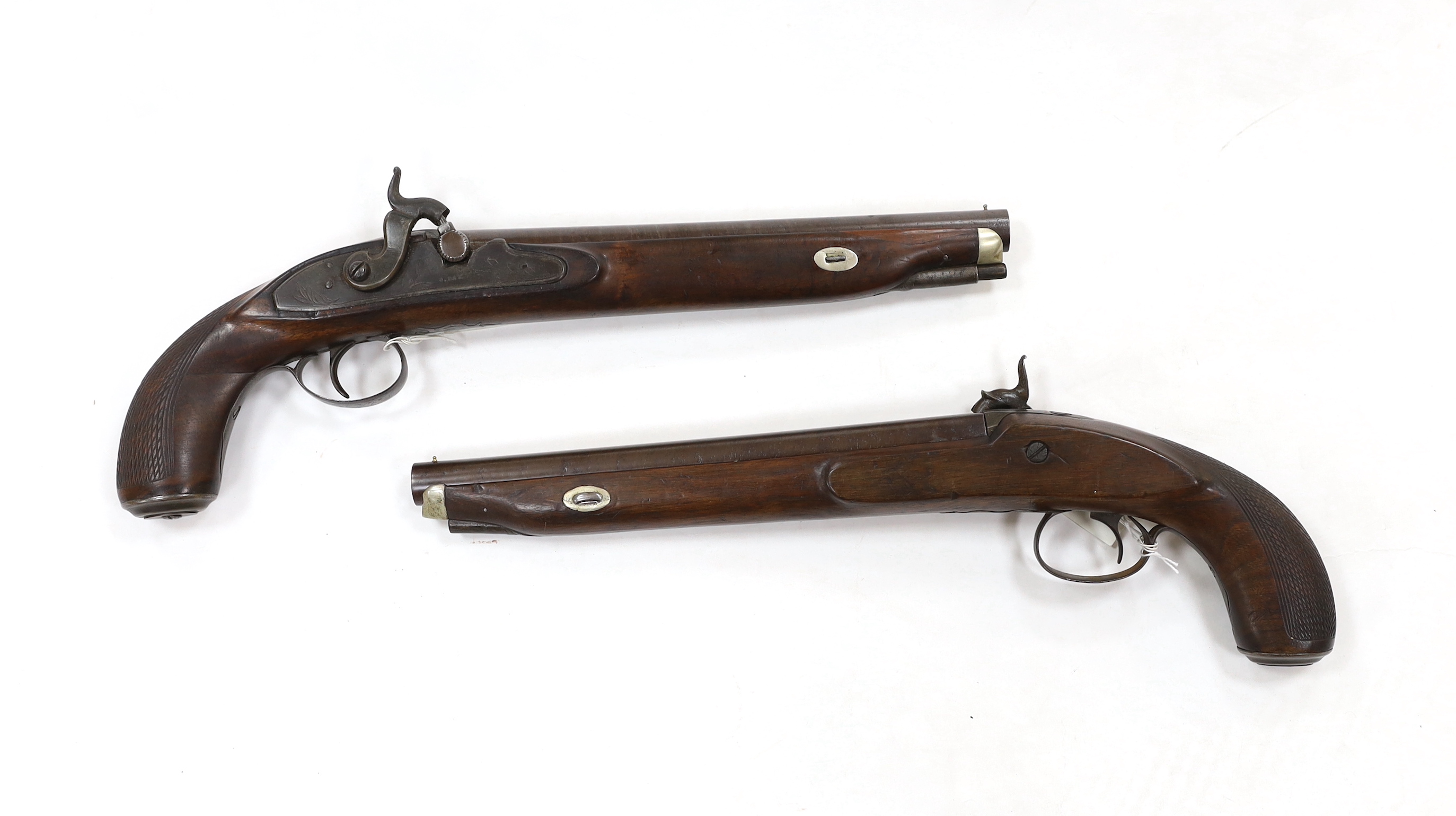 A pair of 12 bore percussion pistols converted from percussion sporting guns, round twist barrels,