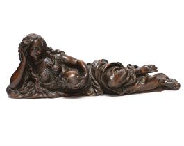 A 17th century carved oak figure of the penitent Mary Magdalene, possibly English, 52.5cm