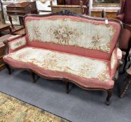 A 19th century French rosewood settee with floral needlepoint upholstery, width 198cm, depth 66cm,
