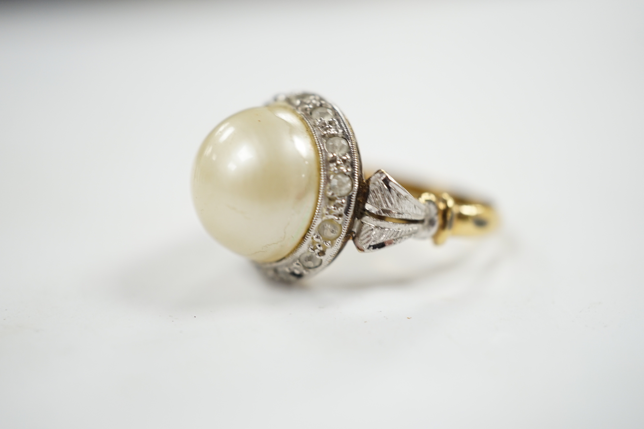 A yellow metal, simulated mabe pearl and paste set cluster ring, size O, gross weight 4.6 grams. - Image 2 of 4