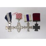 Four well produced replica medals. A Victoria Cross, a Distinguished Service Cross, a Military Cross
