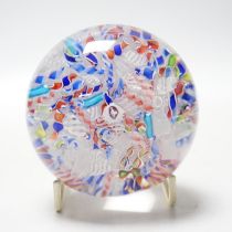 A St Louis paperweight with dog silhouette amid scrambled canes, 8cm diameter