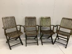 A weathered octagonal teak garden table, width 120cm, height 73cm and four chairs