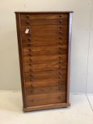 A mid century Sri Lankan mahogany collector's cabinet fitted sixteen graduated drawers, back panel