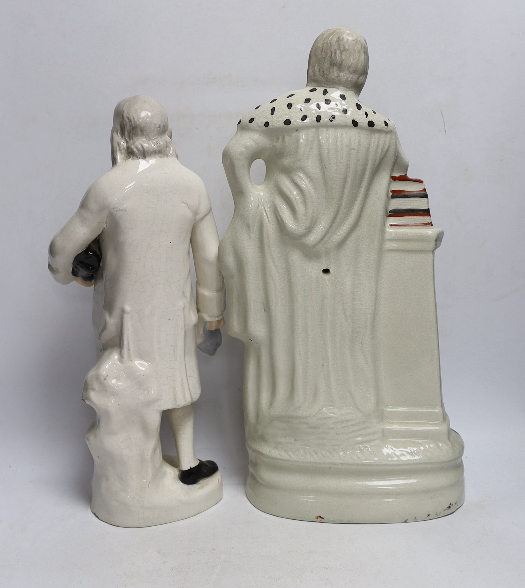 A Staffordshire pottery figure of Benjamin Franklin, modelled holding the Bill of Rights and a - Image 2 of 3
