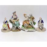 A pair of Dresden figures, a Sitzendorf shepherdess group and another German group