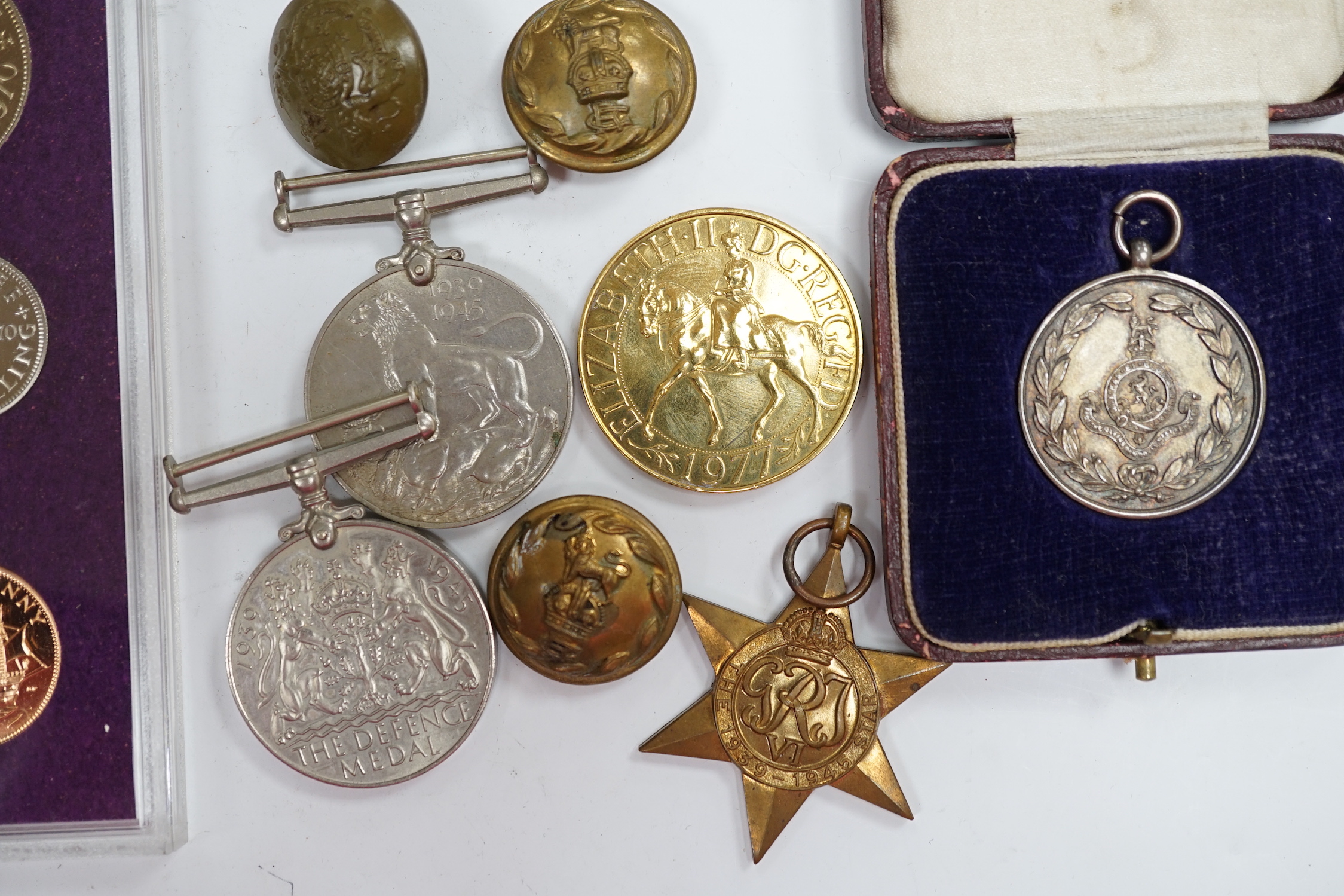 A collection of medals and coins including; an original card Air Ministry box containing a 1939-45 - Image 5 of 9