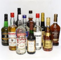 A selection of spirits, brandies and sherries to include Smirnoff, Jules Dumet, Cockspur etc,