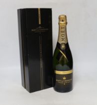 A Bottle of Moet and Chandon Grand Vintage 2000 champagne with box